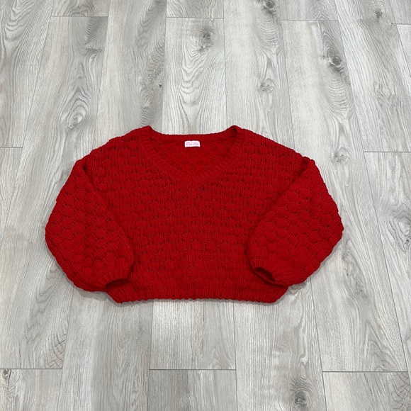 Red sweater. - Picture 1 of 3